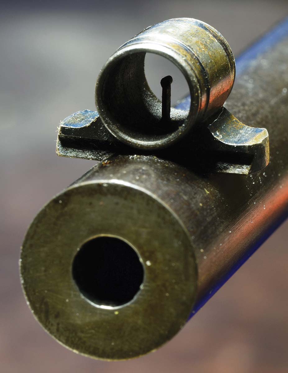 A Marlin “Plain Globe Front Sight” with post and bead. Windage adjustments are made by moving the sight in its dovetail.